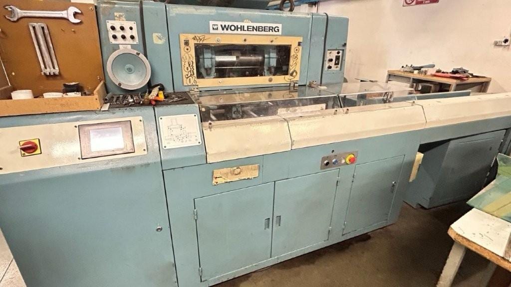 Wohlenberg 44 FM 50 — three-knife trimmer with automatic feeding (1989)