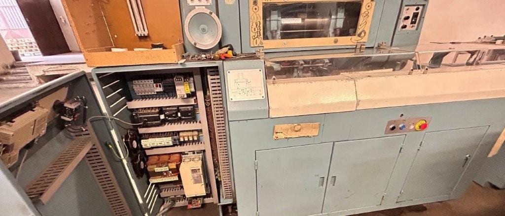 Wohlenberg 44 FM 50 — three-knife trimmer with automatic feeding (1989) 13