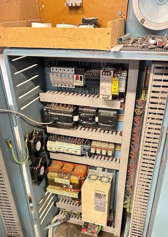 Wohlenberg 44 FM 50 — three-knife trimmer with automatic feeding (1989) 14